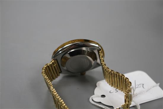 A gentlemans gilt stainless steel Rado Diastar automatic day/date wrist watch.
